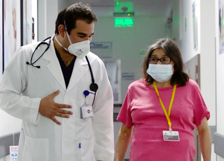 Doctors walking down hallway